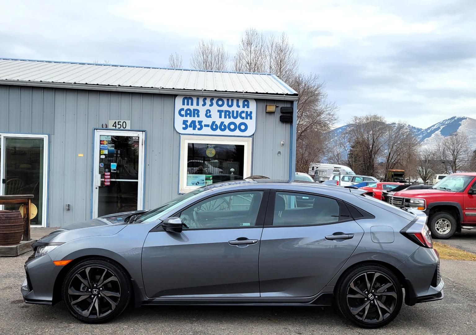 2018 Grey /Black Honda Civic Sport (SHHFK7H40JU) with an 1.5L I4 Turbo engine, Automatic transmission, located at 450 N Russell, Missoula, MT, 59801, (406) 543-6600, 46.874496, -114.017433 - Photo#0